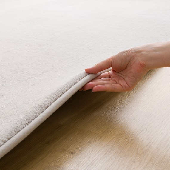 15mmウレタン入り保温+吸湿発熱+蓄熱+防汚ラグ(130X185 ライトモカ cDA04) 18枚目画像